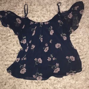 Floral over the shoulder top.Comfortable and sheer